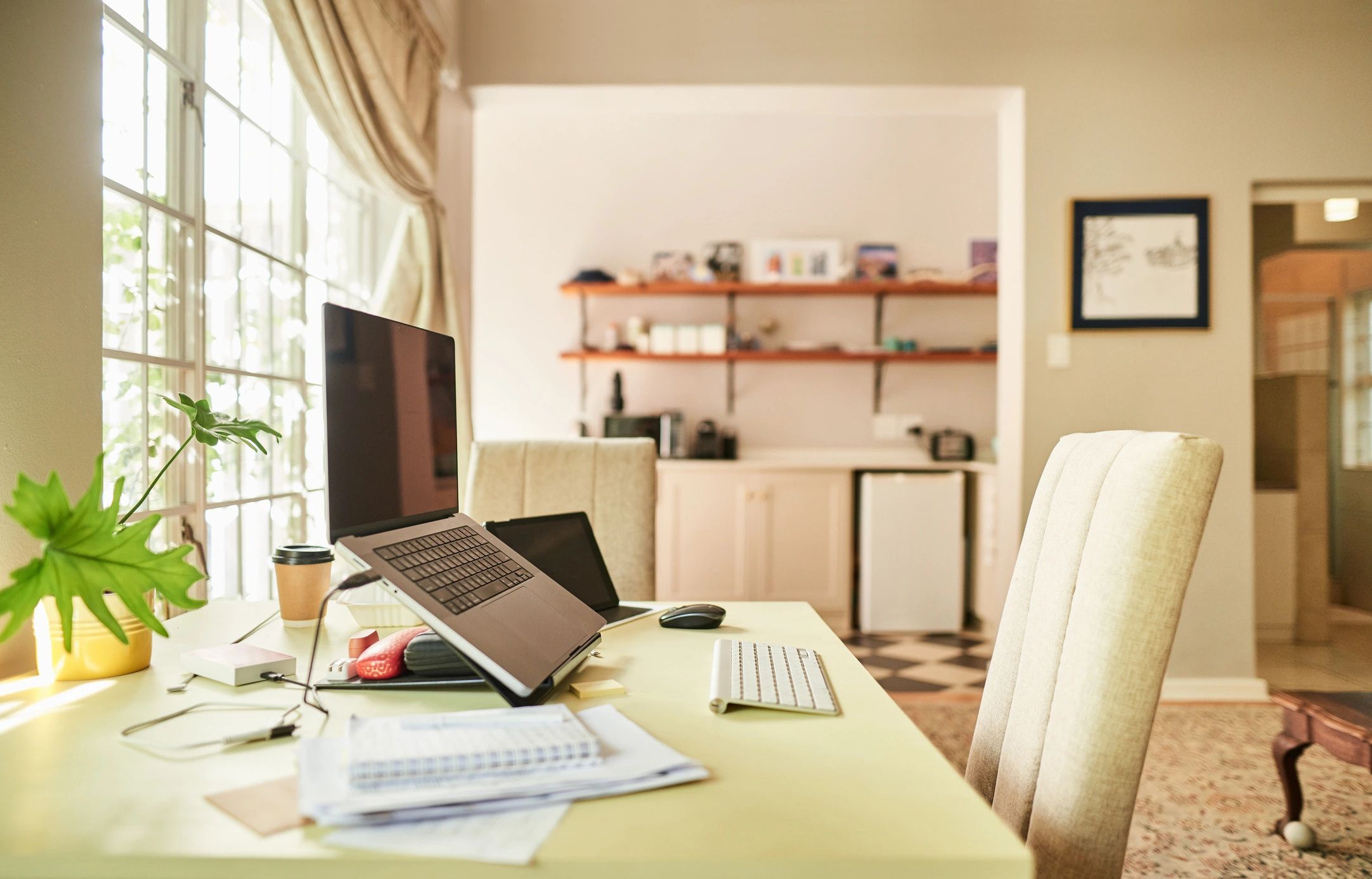 Organized website setup workspace with laptop and tablet